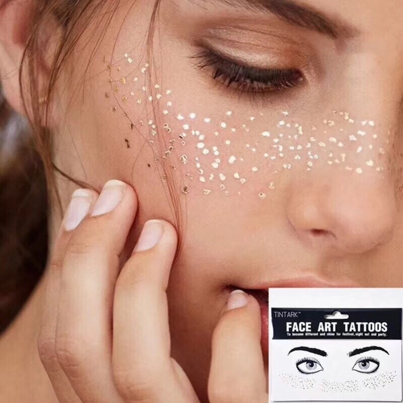 Grimes-Inspired Metallic Face Tattoos